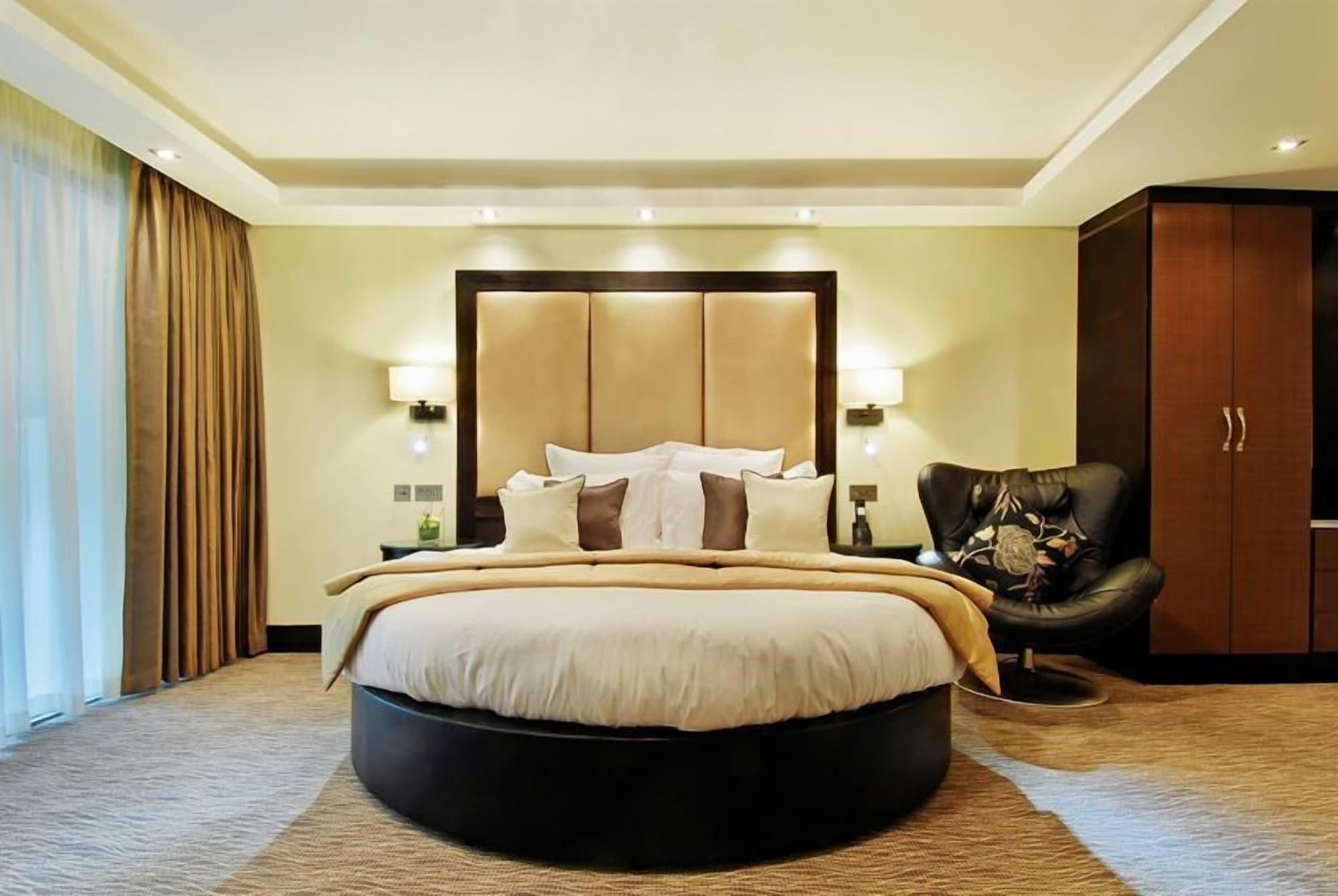 ホテル ザ モントカーム マーブル アーチ ロンドン 部屋 写真 A bedroom at the Taj Bengal