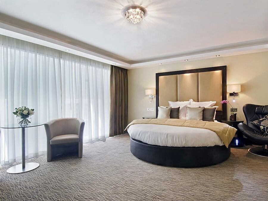ホテル ザ モントカーム マーブル アーチ ロンドン エクステリア 写真 A bedroom at the hotel